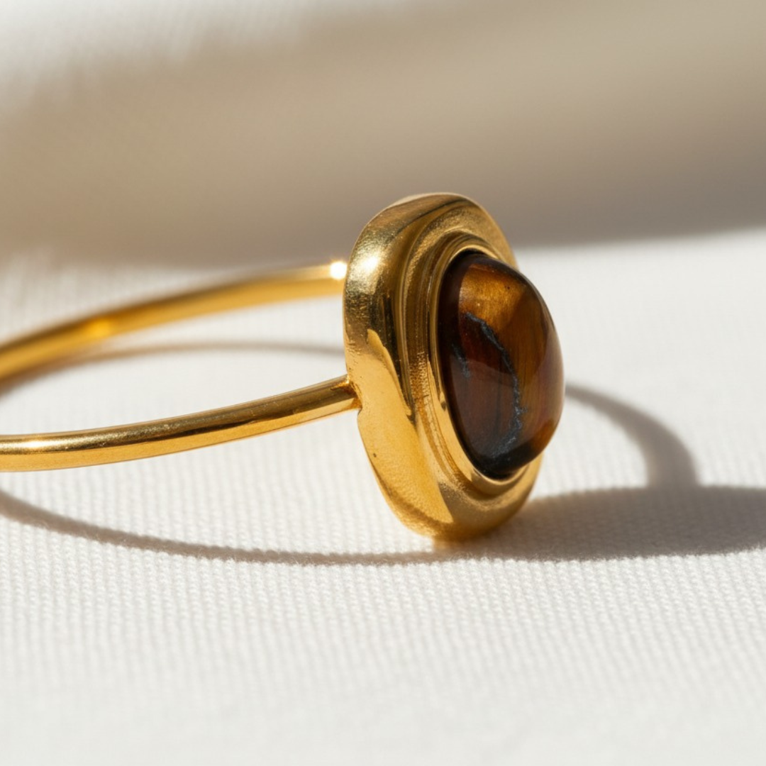 טבעת טייגר איי עם אבן בציפוי זהב 18K – נירוסטה